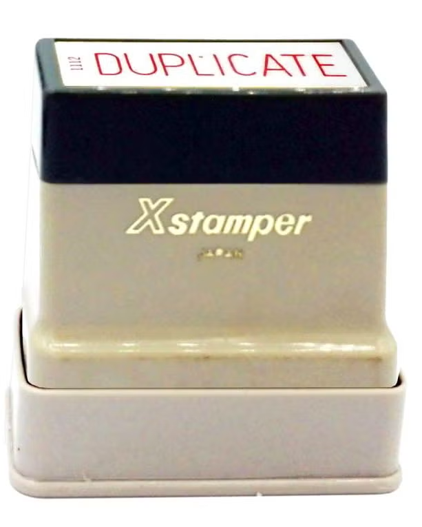 X-Stamper - An inked stamp with the words "Duplicate"
