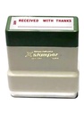 X-Stamper - Inked stamp with the phrase “Received with thanks”