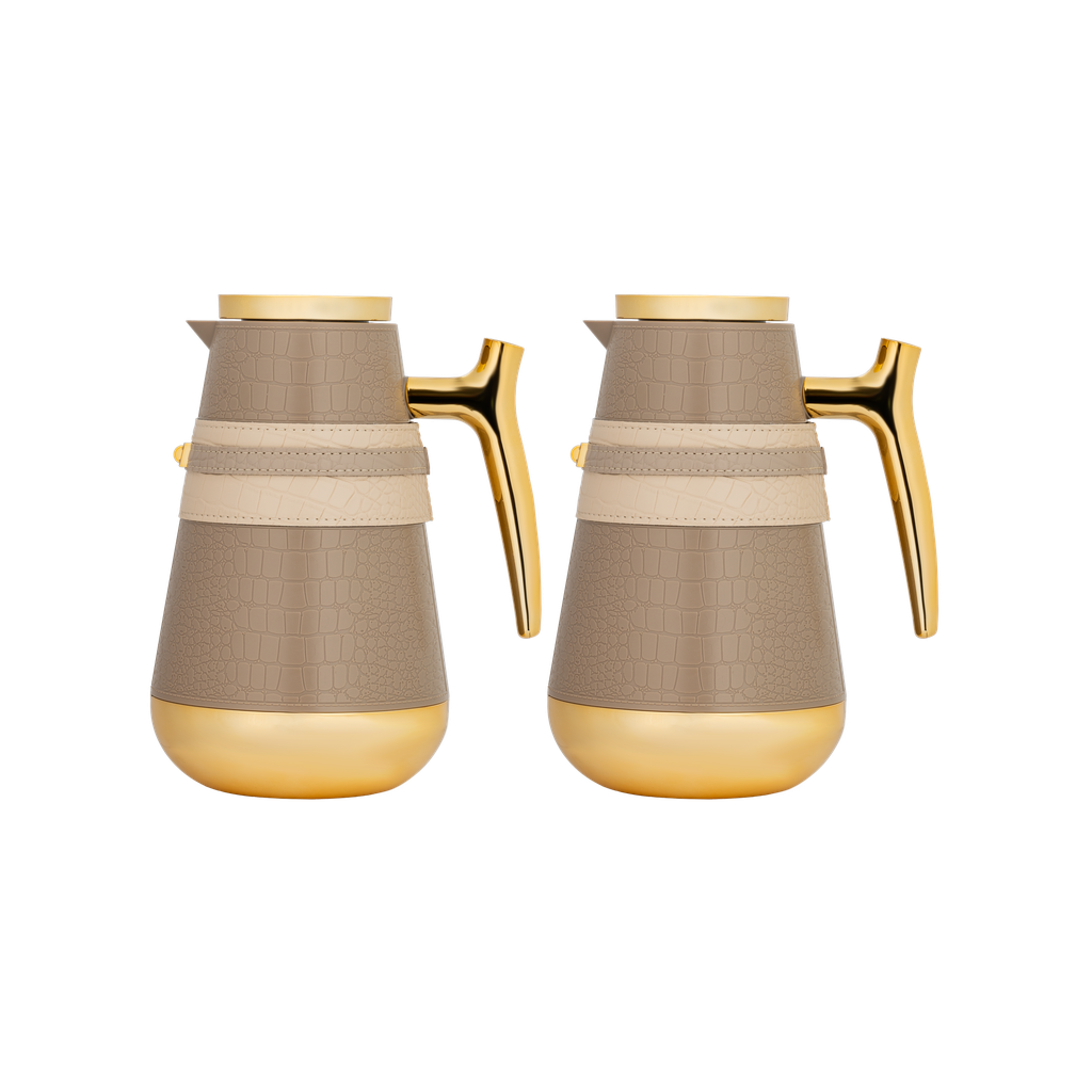 Nirmus two-piece coffee and tea set from Al Saif / Elegant leather design that suits all tastes / Made to maintain the heat of drinks for long hours / Ideal for daily use at home or office / Multi-colored - dark beige with a gilded beige belt