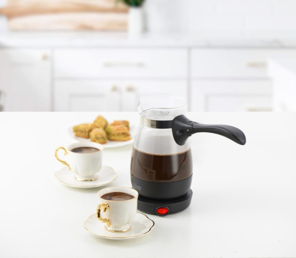 A glass electric kettle with a capacity of 400 ml, with a power of 600 watts, a modern design for preparing Turkish coffee with an authentic flavour.